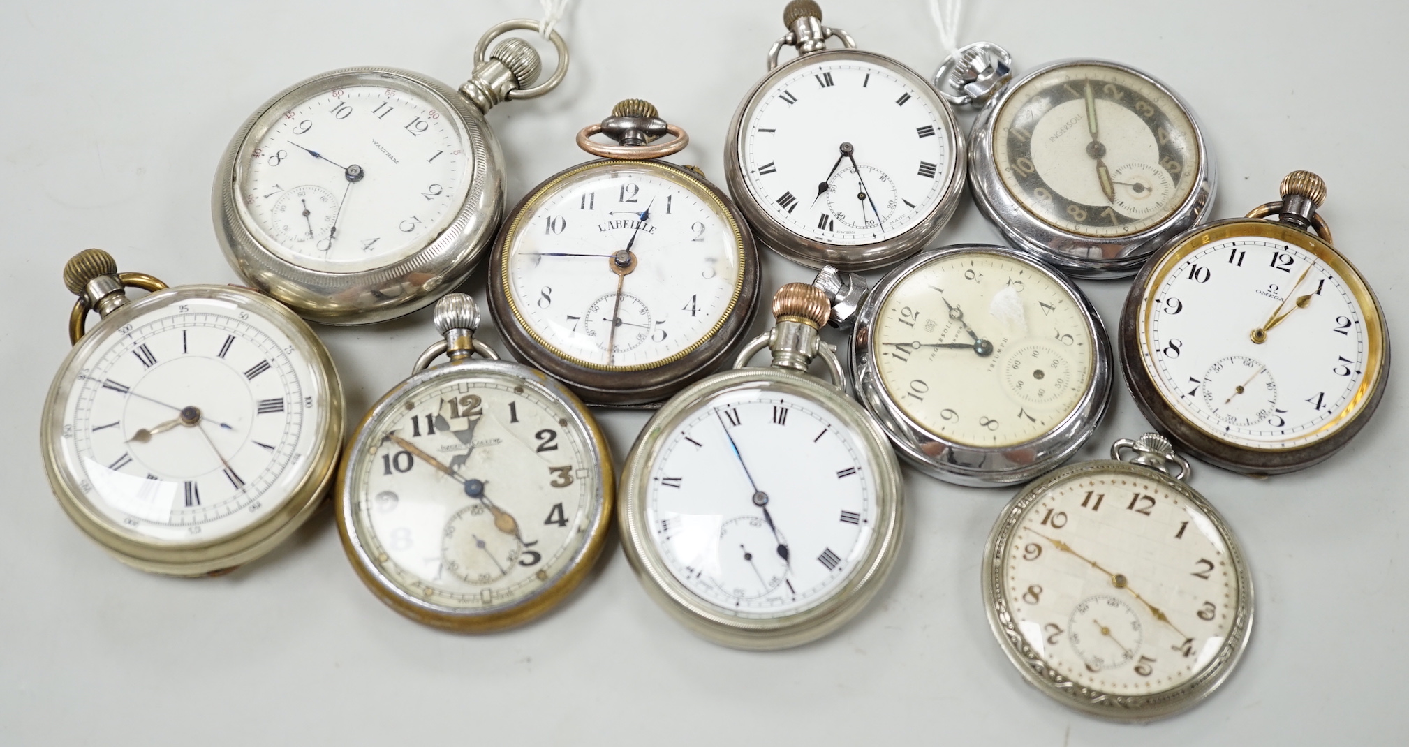 Ten assorted base metal pocket watches including Omega, Waltham and Ingersoll.